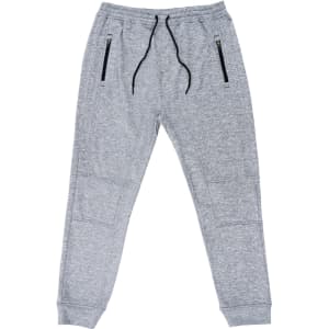 Performance Tech Fleece Jogger Pants in grey, featuring a slim fit and a pocket, modelled from the side.