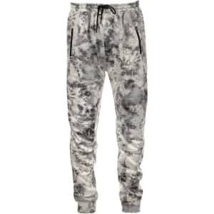 Performance Tech Fleece Jogger Pants in a grey tie-dye pattern, featuring side pockets and an elastic waistband.