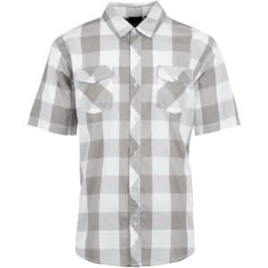A short sleeve button-up shirt in grey and white checkered pattern, featuring two front pockets and a logo.