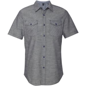 A short sleeve chambray shirt in grey with two chest pockets and a button-up design. Features logo branding.