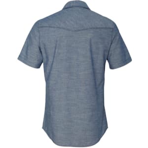 A short sleeve chambray shirt in a light blue shade, featuring a collar and a back yoke design. It has a logo.