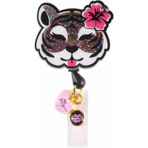 A retractable badge featuring a glittery tiger face design with a pink flower and charm accents in black, white, and pink.