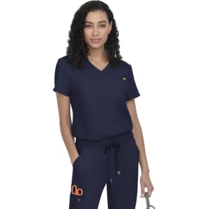 A navy scrubs top featuring a V-neck design and a chest pocket, accompanied by matching pants. It has a logo.