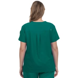 A back view of a woman wearing a teal medical scrub top, featuring a pleated design and short sleeves.