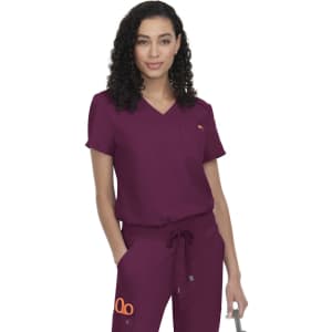 A scrub top in deep burgundy with a logo, featuring a V-neck and short sleeves, paired with matching trousers.
