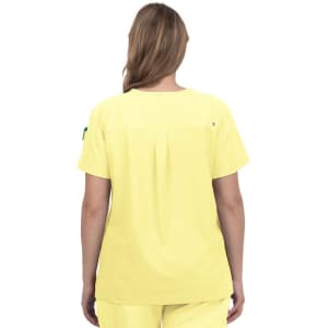 A yellow medical scrubs top with a plain back and a small logo on the sleeve.