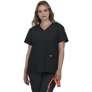 A black medical scrub top with a V-neck design and two front pockets, held by a model. It features a logo.