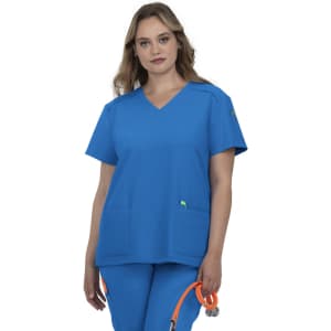 A blue medical scrub top with a V-neck design, featuring two pockets and a logo. The model is holding a stethoscope.