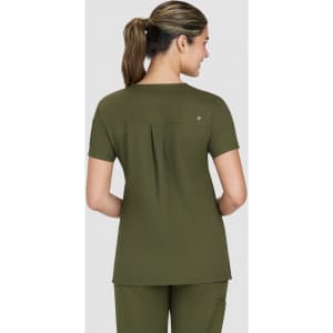 A tops in olive green, featuring a pleated back and a simple design. The model is shown from the back.