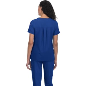 A navy blue medical top with a relaxed fit, featuring a pleat detail at the back. It includes a logo.