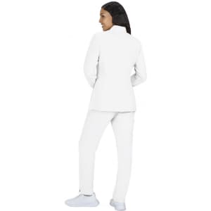 A white women's jacket paired with matching trousers, featuring a structured design and a logo on the garment.