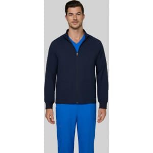 A navy jacket with a zippered front and two pockets, worn by a man in a blue top and pants. The jacket has a logo.