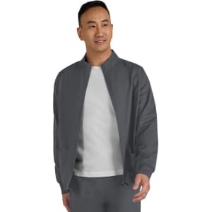 A man wearing a grey Alpha Men's Jacket with a zip front, featuring a simple design and a casual style.