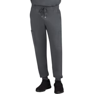 A pair of grey jogger pants with an elastic waistband and side pockets, worn with black shoes.