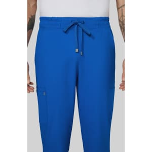 Blue cargo pants featuring an elastic waistband and side pockets, with a logo present on the garment.