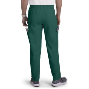A pair of teal cargo pants with an elastic waistband, featuring side pockets and a logo on the back.