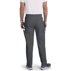 A person wearing grey Neuro Cargo Pants, seen from the back, with pockets visible on the sides.