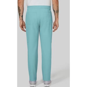 A pair of turquoise cargo pants with an elastic waistband and multiple pockets, viewed from the back.