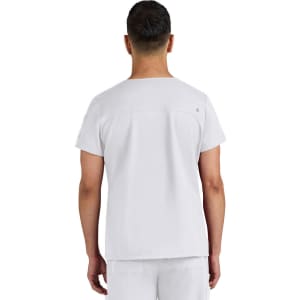 A white medical scrub top featuring a simple design and a small logo on the back.