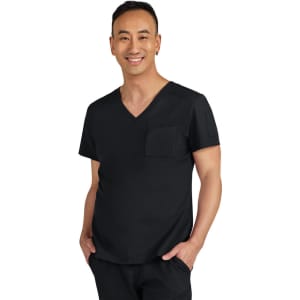 A black medical scrub top with a V-neck and a chest pocket, featuring a smiling male model.