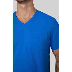 A blue v-neck t-shirt featuring a pocket on the left side. The shirt is displayed on a model.