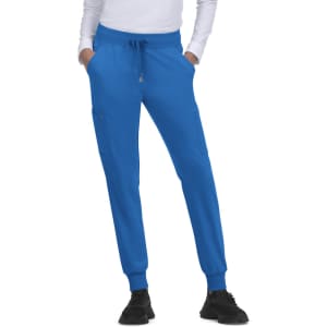 A pair of blue jogger pants with elastic cuffs and pockets, styled for a casual look.