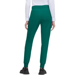 A pair of teal jogger pants with a tapered fit and cuffed hems, featuring pockets and an elastic waistband.