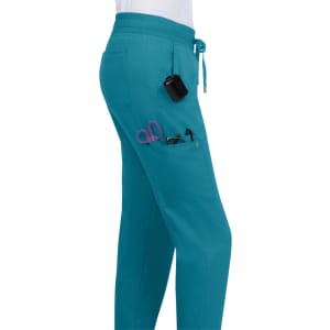 A pair of teal jogger pants featuring pockets for tools and a drawstring waistband.