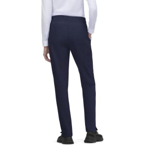 Atria Pant in navy blue, featuring a sleek design and a back view with a pocket. Includes branding on the waistband.