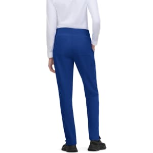 Atria Pant in bright blue, featuring a fitted design and a logo on the back.