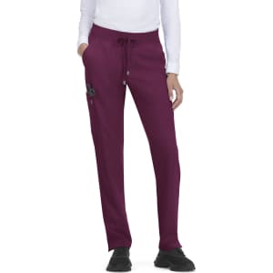 Atria Pant in deep plum, featuring a drawstring waist and side pockets, with an understated logo.