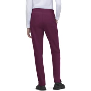 Atria Pant in deep burgundy with a smooth fit and pockets, designed for comfort. Features a brand logo on the rear.