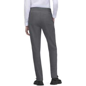 Atria Pant in grey, featuring a simple design and a visible logo on the back. Suitable for a casual look.