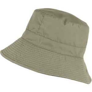 A green reversible sun hat with a wide brim, featuring a textured surface and a subtle branding logo.