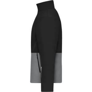 A side view of a softshell jacket featuring black and grey colours, with a zippered pocket and a logo.