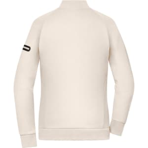 A cream-coloured ladies zip jacket with a fitted design and a logo on the sleeve.