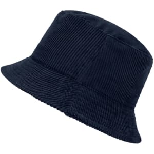 A navy corduroy bucket hat with a textured finish and a wide brim. Features a logo detail.