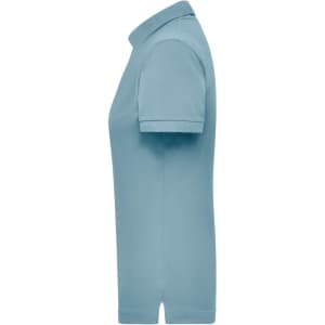 A light blue women's polo shirt with a short sleeve and a collar, featuring a logo.