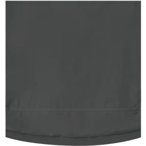 A dark grey 3-in-1 ladies jacket featuring a smooth fabric and a zippered pocket. It has a logo on the side.