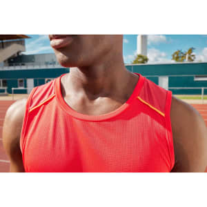 A men's running tank in vibrant red with yellow accents, featuring a logo on the chest area.