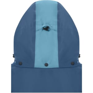 A hardshell rainjacket in navy blue and light blue, featuring an adjustable hood and snap closures.