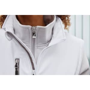 A softshell work vest in light grey, featuring a high collar and zippered pockets, with a logo displayed.