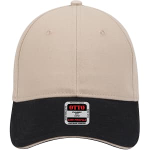 A beige and black 6-panel low profile baseball cap with a logo on the front.