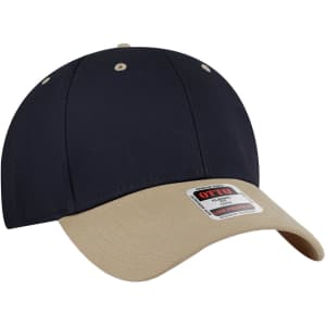 A navy and beige 6 panel low profile baseball cap featuring a branded label.