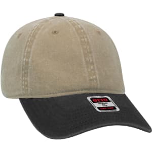 A beige and black 6 panel low profile dad cap with a logo on the front.