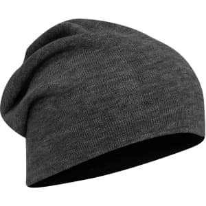 A dark grey slouch beanie featuring a soft, textured fabric and a relaxed fit. It has a subtle logo on it.