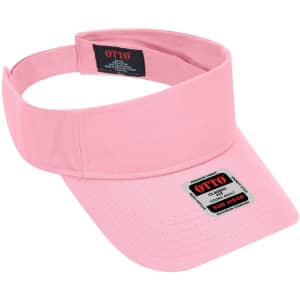 A pink sun visor with a wide brim and adjustable strap. It features a logo and branding on the front.