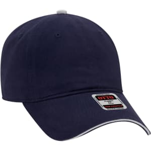 A navy blue low profile baseball cap featuring a branding label and a contrasting peak.
