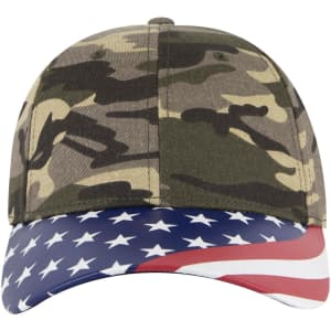 A camouflage baseball cap featuring a visor with an American flag design and a logo.