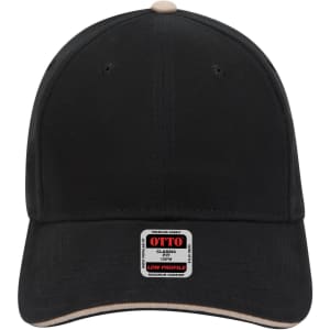 A black low profile baseball cap featuring a light beige underbill and a logo on the front.